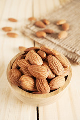 Almond snack fruit in wooden bowl