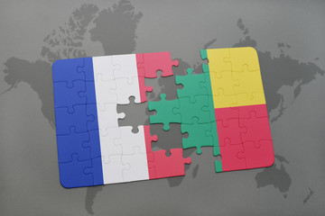 puzzle with the national flag of france and benin on a world map background.