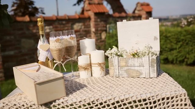 Wedding decoration in the style of boho, floral arrangement, decorated table in the garden.