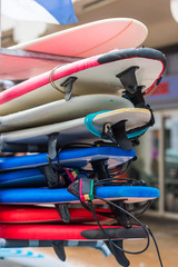 Surf boards in a stack