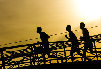 Fototapeta na wymiar jogger in sunset