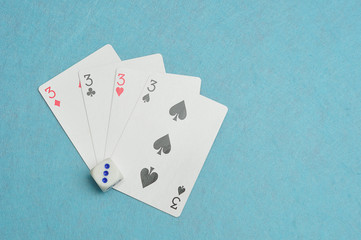 The different suits of a the number 3 card in a deck of cards di