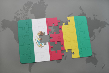 puzzle with the national flag of mexico and guinea on a world map background.