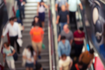 Abstract blurred background many of people walking and standing