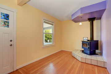 Empty entrance room with Vintage fireplace in the corner