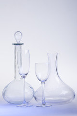 Empty decanters with wine glass