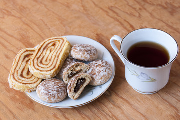Rolls and cakes with fruit filling for tea