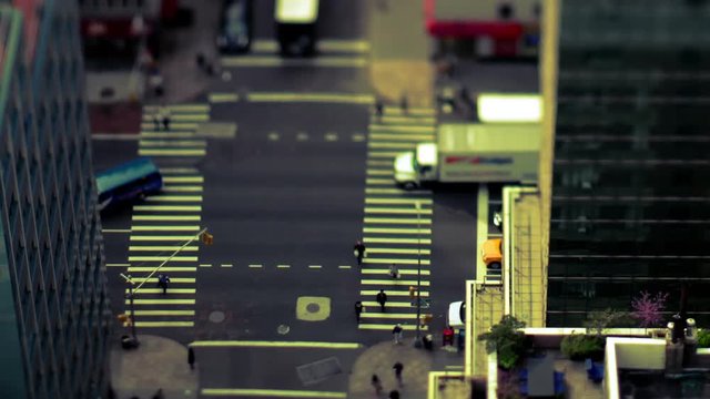 manhattan street scene with traffic and people