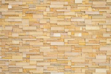 Background of old and dirty vintage rough orange brick stone Cladding wall.