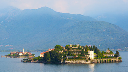 Fototapeta na wymiar Palace and gardens in Isola Bella in Lake Maggiore. Italy, with Isola dei Pescatori in the background