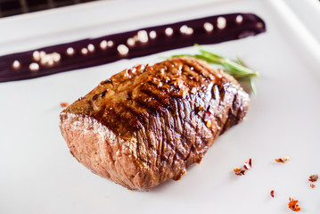 tasty steak with sauce