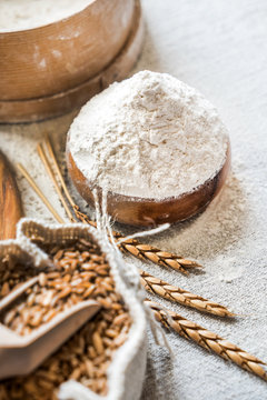 wheat and flour on the table