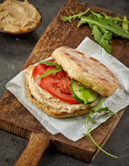 Sandwich with humus and vegetables