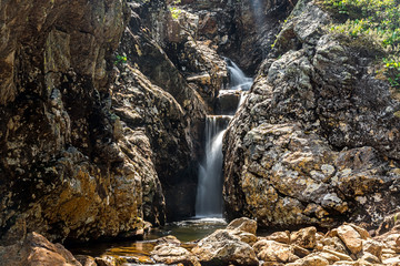 Obraz premium The narrow canyon of the Kamenka river in Khamar-Daban ridge