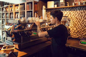 Barista at work in a coffee shop