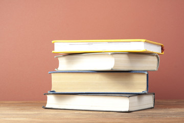 Stack of colorful books. Education background. Back to school. Copy space for text.