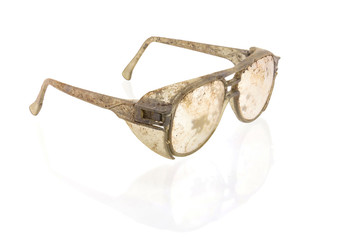 old plastic glasses isolated on a white background