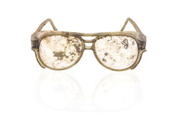 old plastic glasses isolated on a white background
