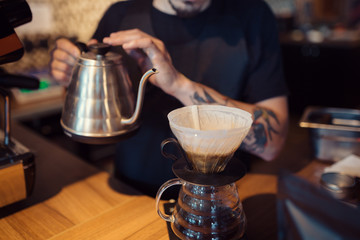Barista at work in a coffee shop