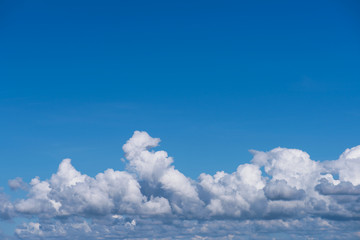 Sky clouds as nature background with copy space. Cumulus clouds. 