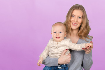 Happy young mother and her son