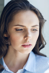 Close up portrait of beautiful young woman face
