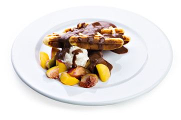 Belgium waffles with fresh berries and chocolate sauce
