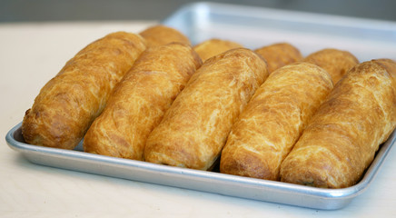 Georgian tsomi with potatoes on a tray