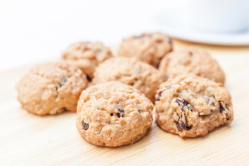 Close up texture of oatmeal cookies on wooden background.