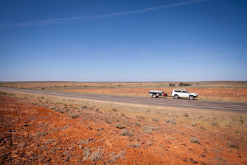 Touring Outback Australia - Four Wheel Drive Towing Camper Trailer © vekidd