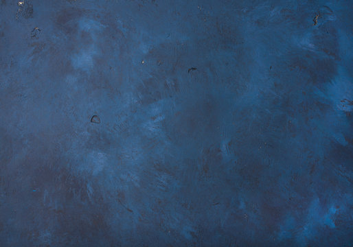 Dark blue painted old plywood texture, background and wallpaper