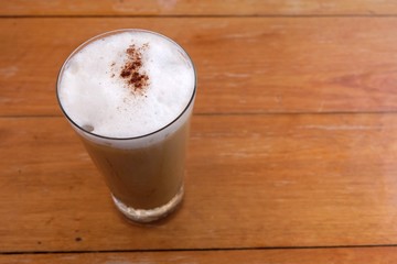 Iced coffee on the wooden table