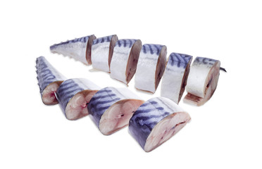 Sliced uncooked atlantic mackerel on a light background
