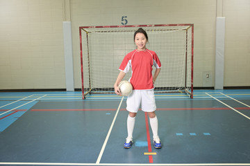 Female soccer player in a stadium