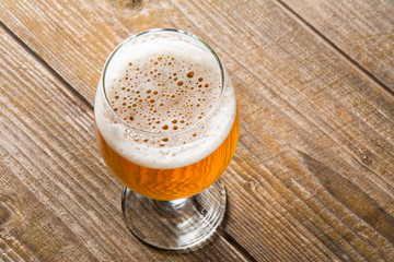 Glass beer on wooden background with copyspace. wallpaper