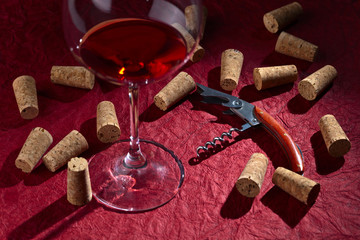 red wine and corkscrew