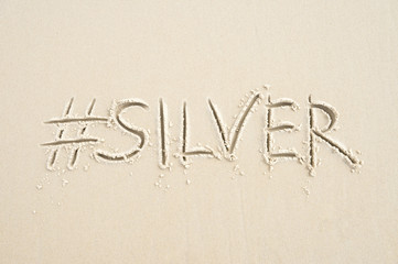 Fototapeta na wymiar Hashtag social media message for silver medal, sport's second place, written in sand on the beach in Rio de Janeiro, Brazil