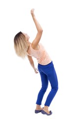 Balancing young woman.  or dodge falling woman. Rear view people collection.  backside view of person.  Isolated over white background. Blonde in blue pants and a pink blouse falls on his back.