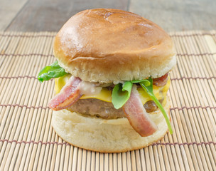 pork hamburger on wood plate