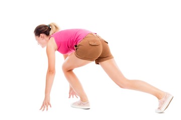 Fototapeta premium side view woman start position. Rear view people collection. backside view of person. Isolated over white background. The girl in brown shorts and a pink t-shirt has been run.