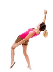 Balancing young woman.  or dodge falling woman. Rear view people collection.  backside view of person.  Isolated over white background. The girl in brown shorts and a pink shirt falls on his back.