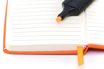 Orange notepad and marker