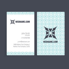 Business cards with monochrome geometrical patterns.