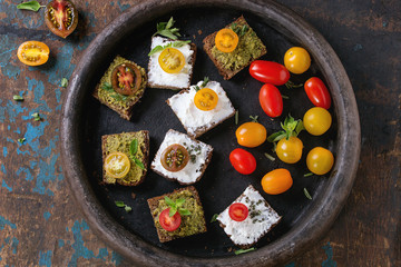 Small sandwiches with tomatoes