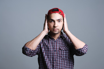 can not hear anything, the guy closed the ears with his hands