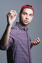young man writes the text in the air, the topic of students and
