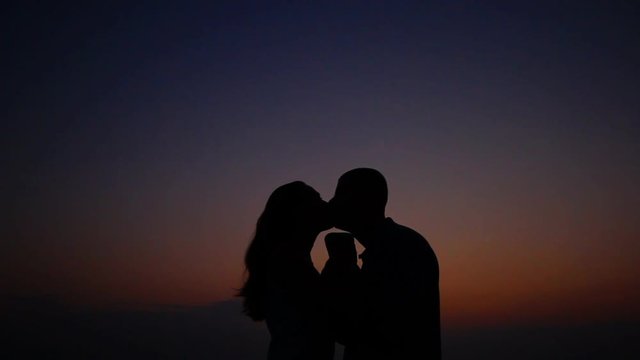 couple admiring the sunset