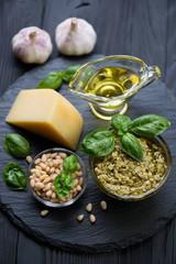 Close-up of ingredients for preparing basil pesto sauce