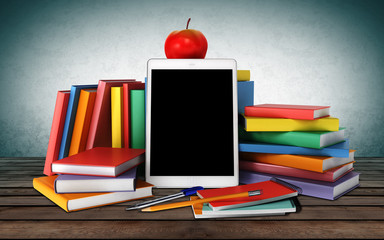tablet, colorful books, school supplies and an apple - back to school
