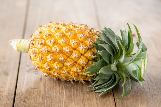 pineapple on the wood  background